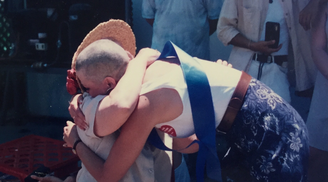 Margaret sharing a special moment with her mum after her shave.